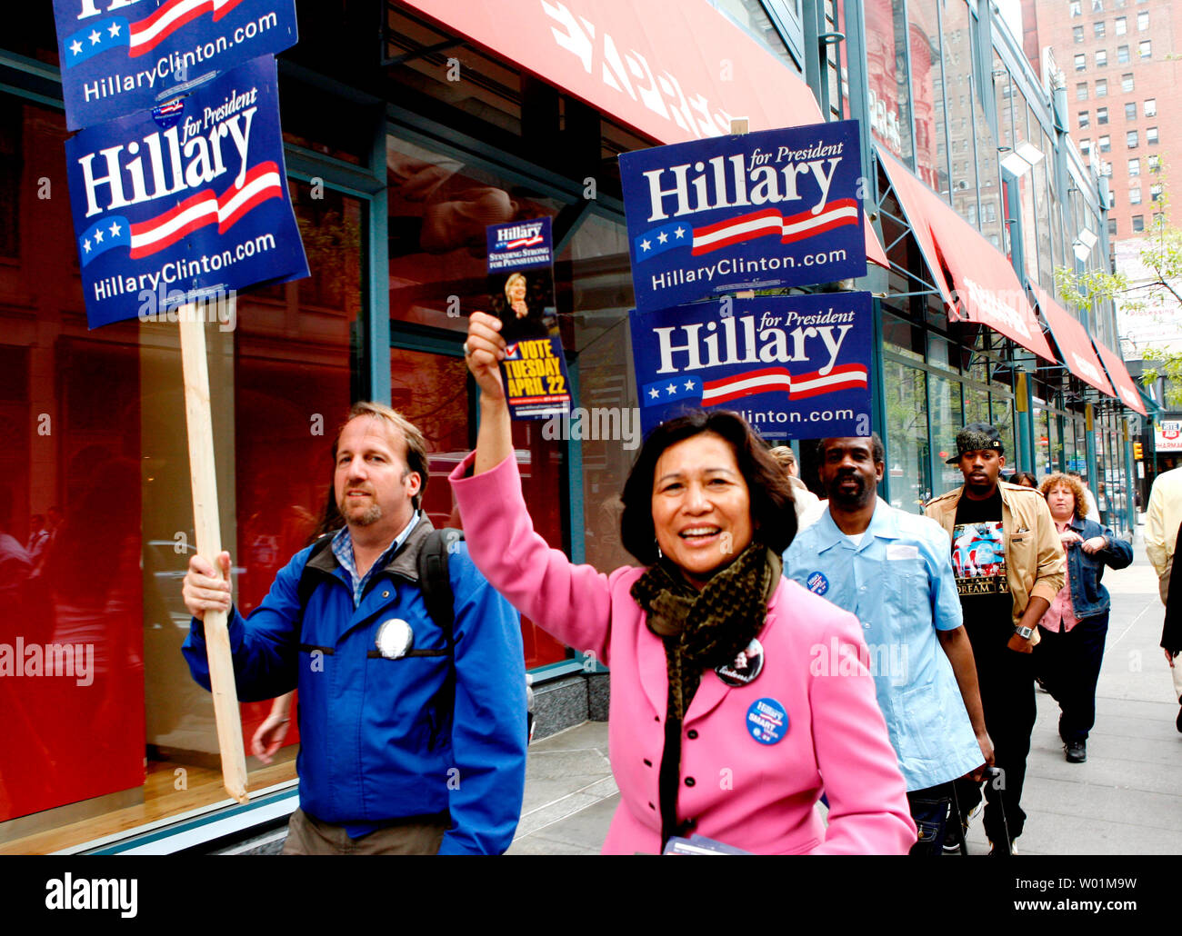 Volunteers for Democratic Presidential candidate Hillary Clinton walk through the streets in downtown Philadelphia April 22, 2008. They were handing out campaign literature and urging everyone to vote. Voters in Pennsylvania went to the polls today to vote in the Pennsylvania Primary.     (UPI PhotoJohn Anderson) Stock Photo