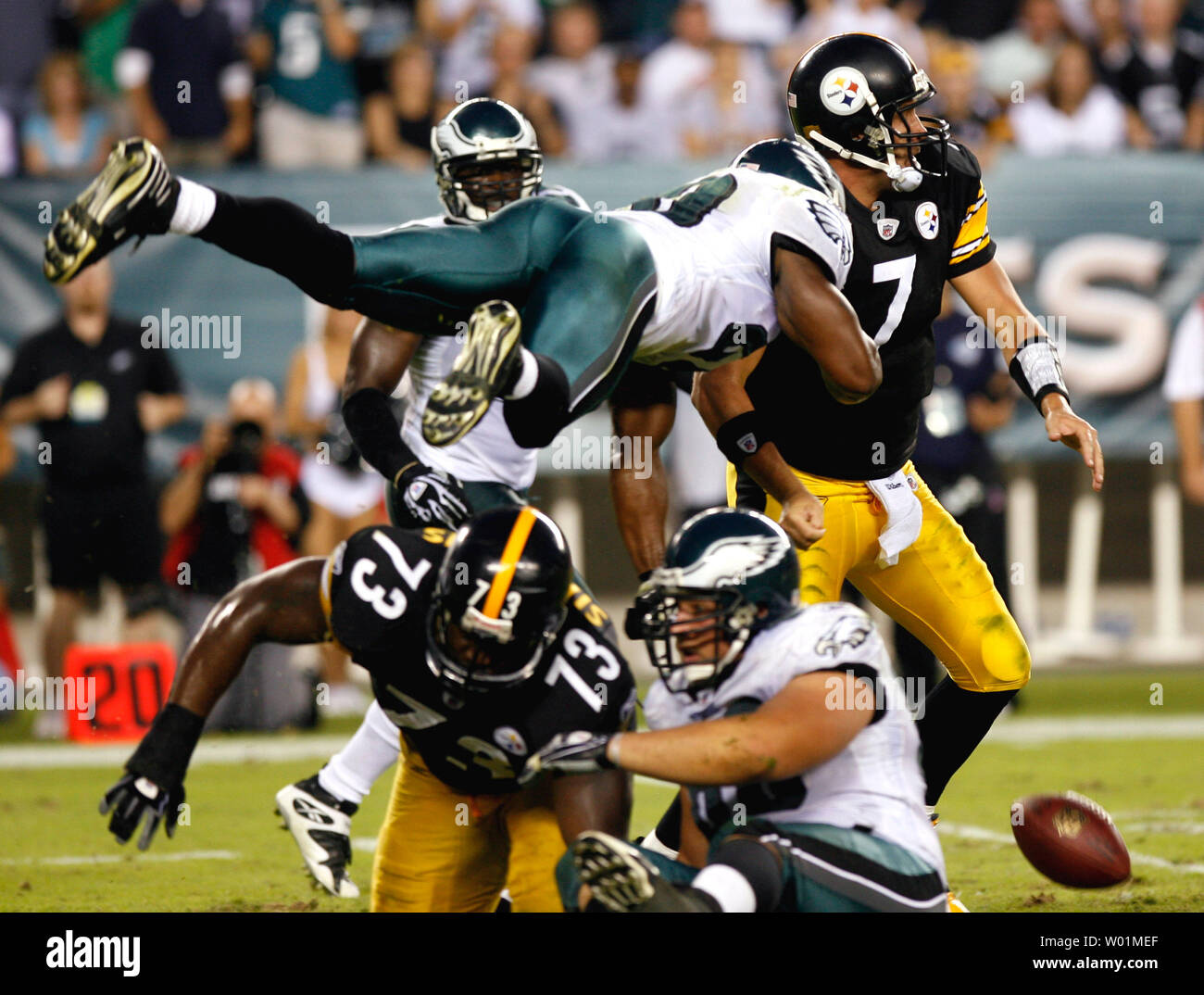 Philadelphia Eagles Brian Dawkins flies through the air over Pittsburgh Steelers Dendall Simmons (73) to break up a pass by Pittsburgh's quarterback Ben Roethlisberger during fourth quarter play in Philadelphia at Lincoln Financial Field September 21, 2008.  Philadelphia defeated Pittsburgh 15-6.      (UPI Photo/John Anderson) Stock Photo