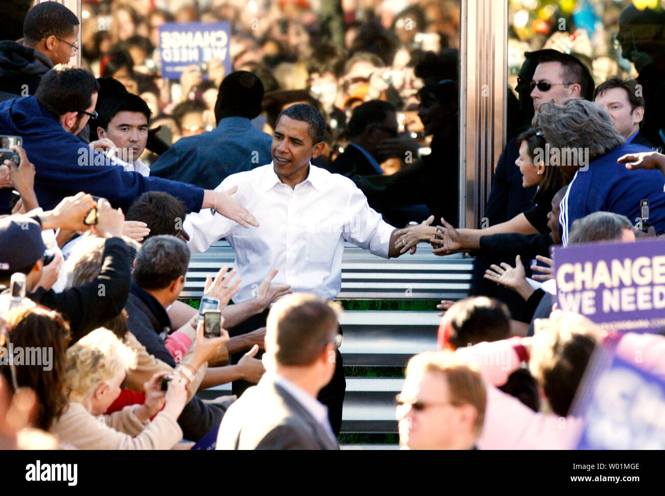Democratic presidential candidate Barack Obama shakes hands with both hands as he threads his way through the crowd upon his arrival for a campaign stop at the Mayfair Dinner in northeast Philadelphia October 11, 2008.       (UPI Photo/John Anderson) Stock Photo