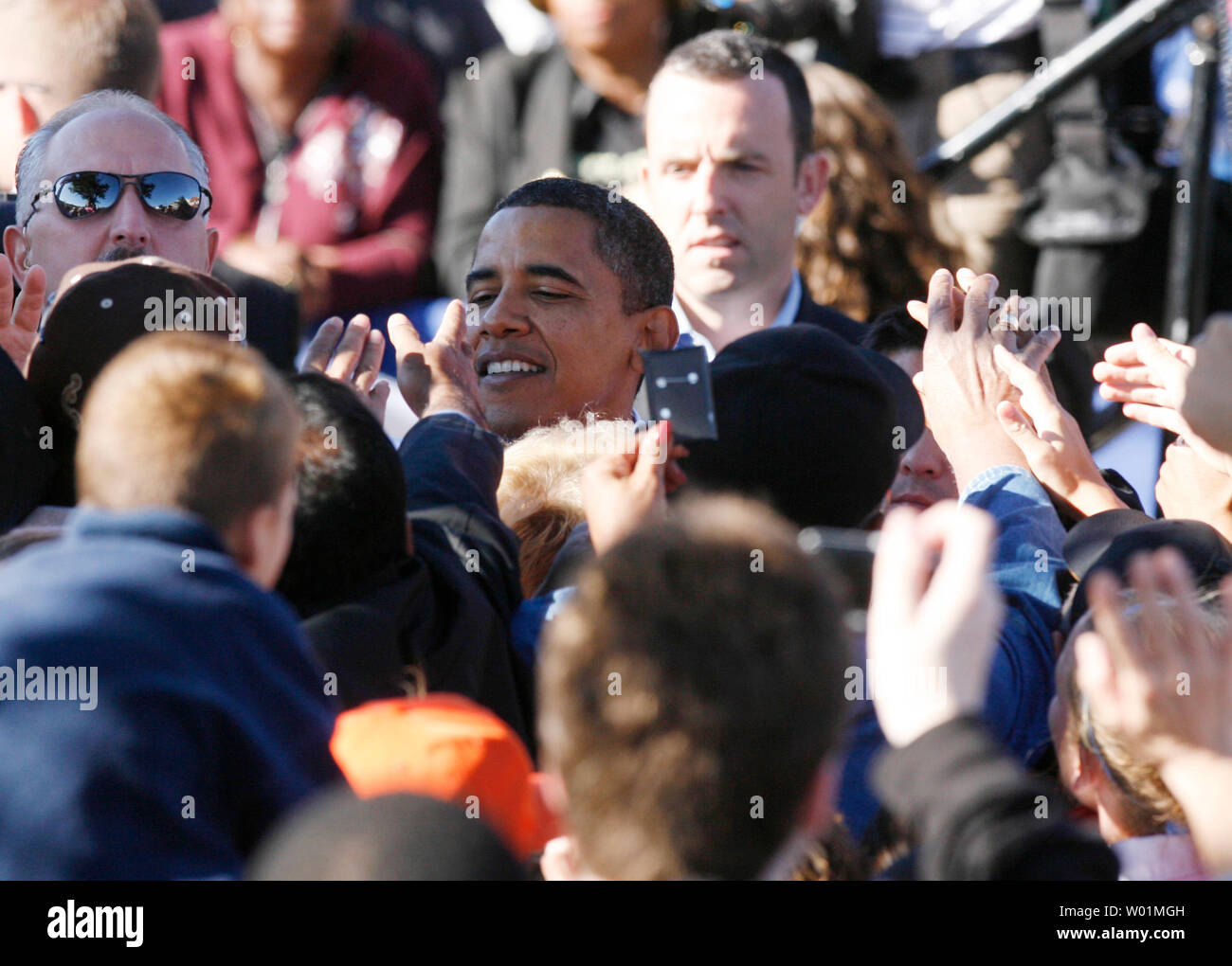 Democratic presidential candidate Barack Obama is surrounded by cameras and people reaching to shake his hand after his  large morning rally outside the Mayfair Dinner in northeast Philadelphia on October 11, 2008.              (UPI Photo/John Anderson) Stock Photo