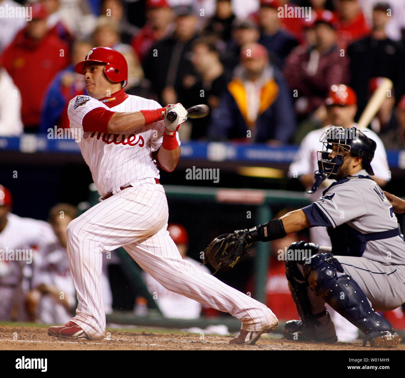 Philadelphia Phillies catcher Carlos Ruiz hits a infield single during  ninth inning World Series game 3 play with the Tampa Bay Rays in  Philadelphia at Citizens Bank Park October 25, 2008. His