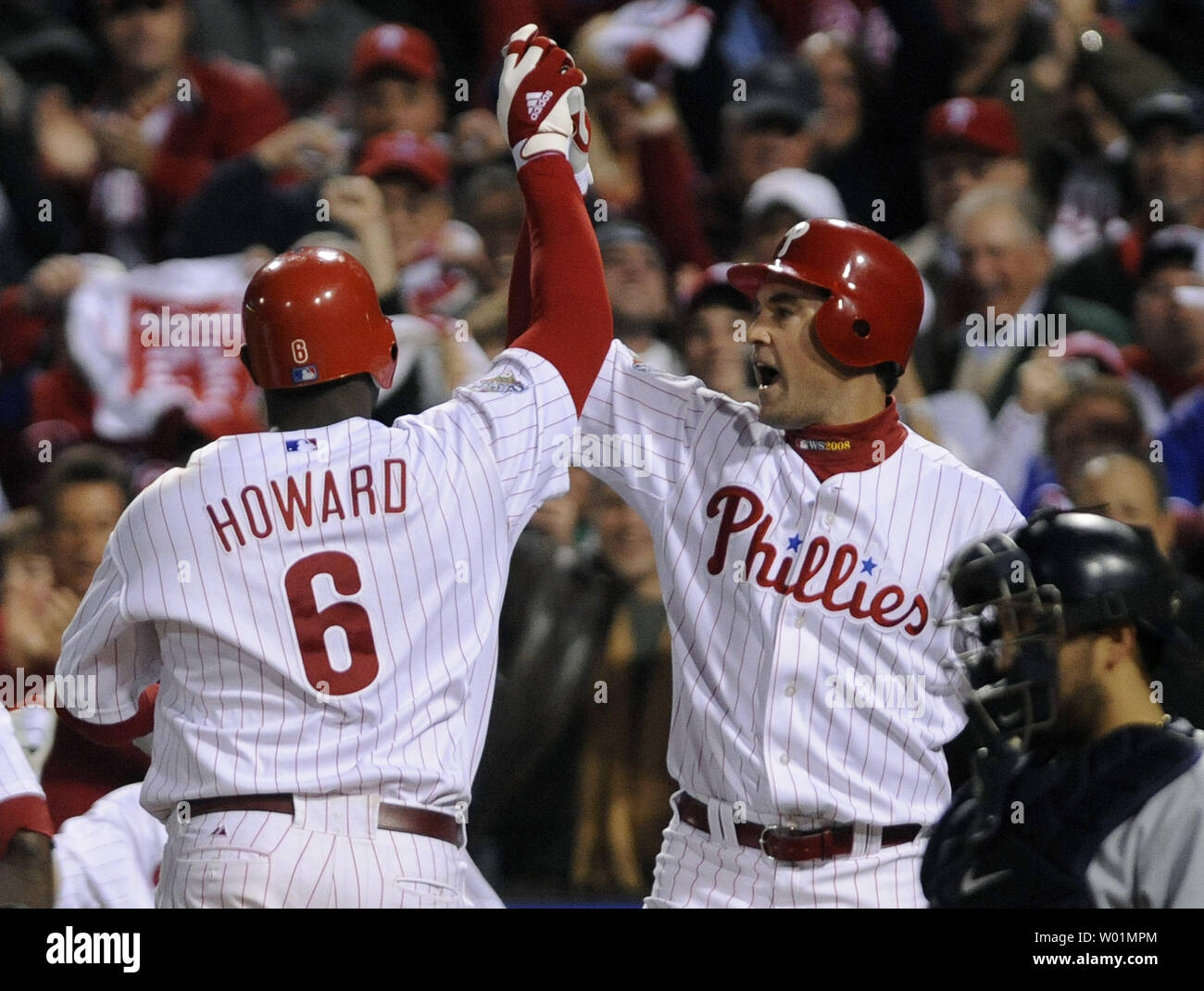 Philadelphia Phillies first baseman Ryan Howard is congratulated