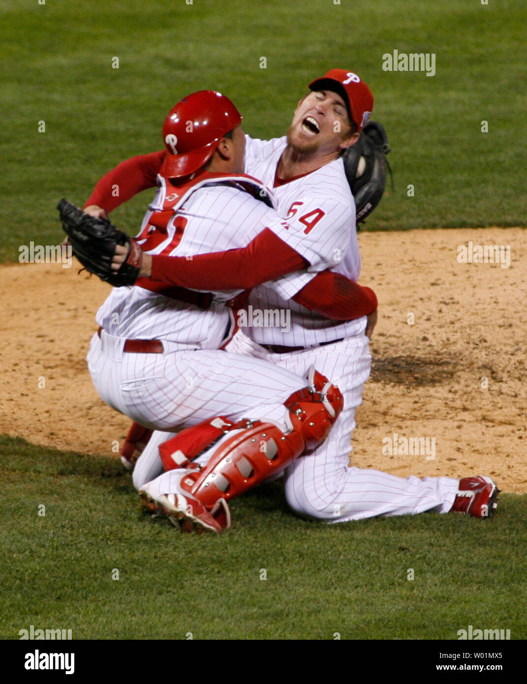 Philadelphia Phillies catcher Carlos Ruiz embraces relief pitcher Brad  Lidge after Philadelphia defeated the Tampa Bay Rays to win the 2008 World  Series in Philadelphia at Citizens Bank Park October 29, 2008. (