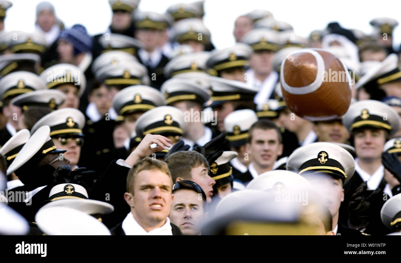 Navy's fans toss a huge football around in the stands as they watch Navy defeat Army 17-3 in the 110 annual Army-Navy game in Philadelphia at Lincoln Financial Field December 12, 2009.  UPI/John Anderson Stock Photo