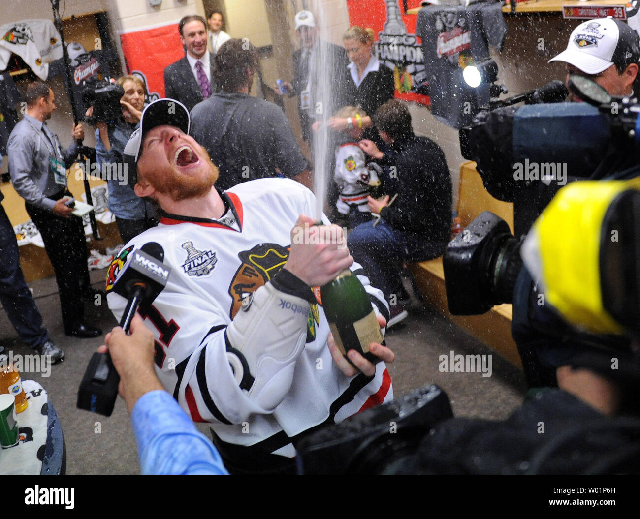 Chicago Blackhawks right wing Marian Hossa celebrates in the  locker room after the Blackhawks won the Stanley Cup defeating the Philadelphia Flyers 4-3 during game six of the 2010 Stanley Cup Final in Philadelphia on June 9, 2010. UPI/Kevin Dietsch Stock Photo