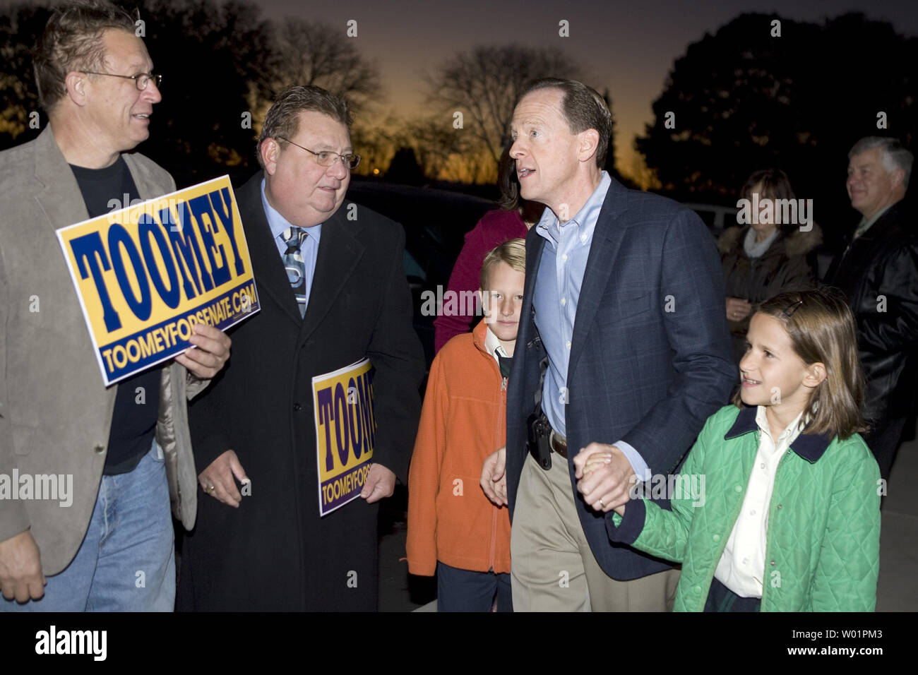 Pennsylvania U.S. Senate Republican candidate Pat Toomey is greeted by sign carrying supporters as he arrives to vote in rural Pennsylvania at the crack of dawn November 2, 2010. He is accompanied by his two children Patrick, age 9 and Bridget, age 10.          UPI/John Anderson Stock Photo