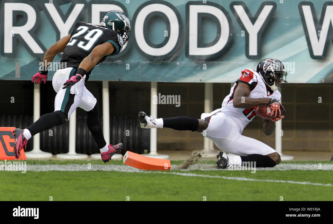 Atlanta Falcons' Julio Jones slips past the Philadelphia Eagles' Nate Allen for the Falcons' third touchdown in the second quarter at Lincoln Financial Field in Philadelphia on October 28, 2012.  UPI/Laurence Kesterson Stock Photo