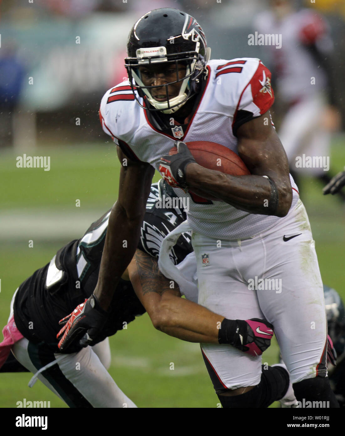The Atlanta Falcons' Julio Jones is tackled by Philadelphia Eagles' Curt Coleman in the third quarter of NFL action at Lincoln Financial Field in Philadelphia on October 28, 2012.  Falcons defeated the Eagles 30-17.  UPI/Laurence Kesterson Stock Photo