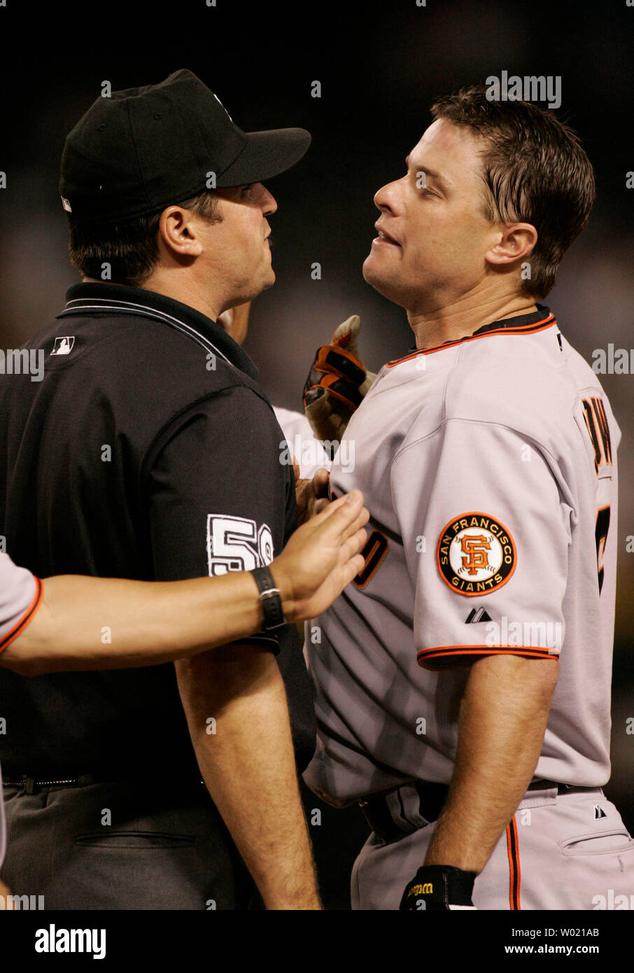 San Francisco Giants J.T. Snow argues with the first base umpire Tony  Randazzo after being called out at first in a fifth inning doubleplay  against the Arizona Diamondbacks on June 29, 2005