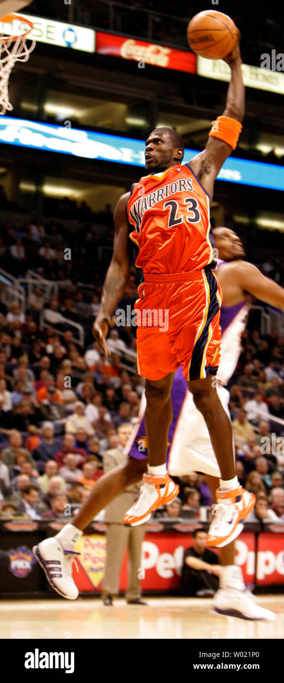 Golden State Warrior Jason Richardson 23 Puts In A Dunk Against The Phoenix Suns In The Golden State Warrior Jason Richardson 23 Puts In A Dunk Against The Phoenix Suns In The