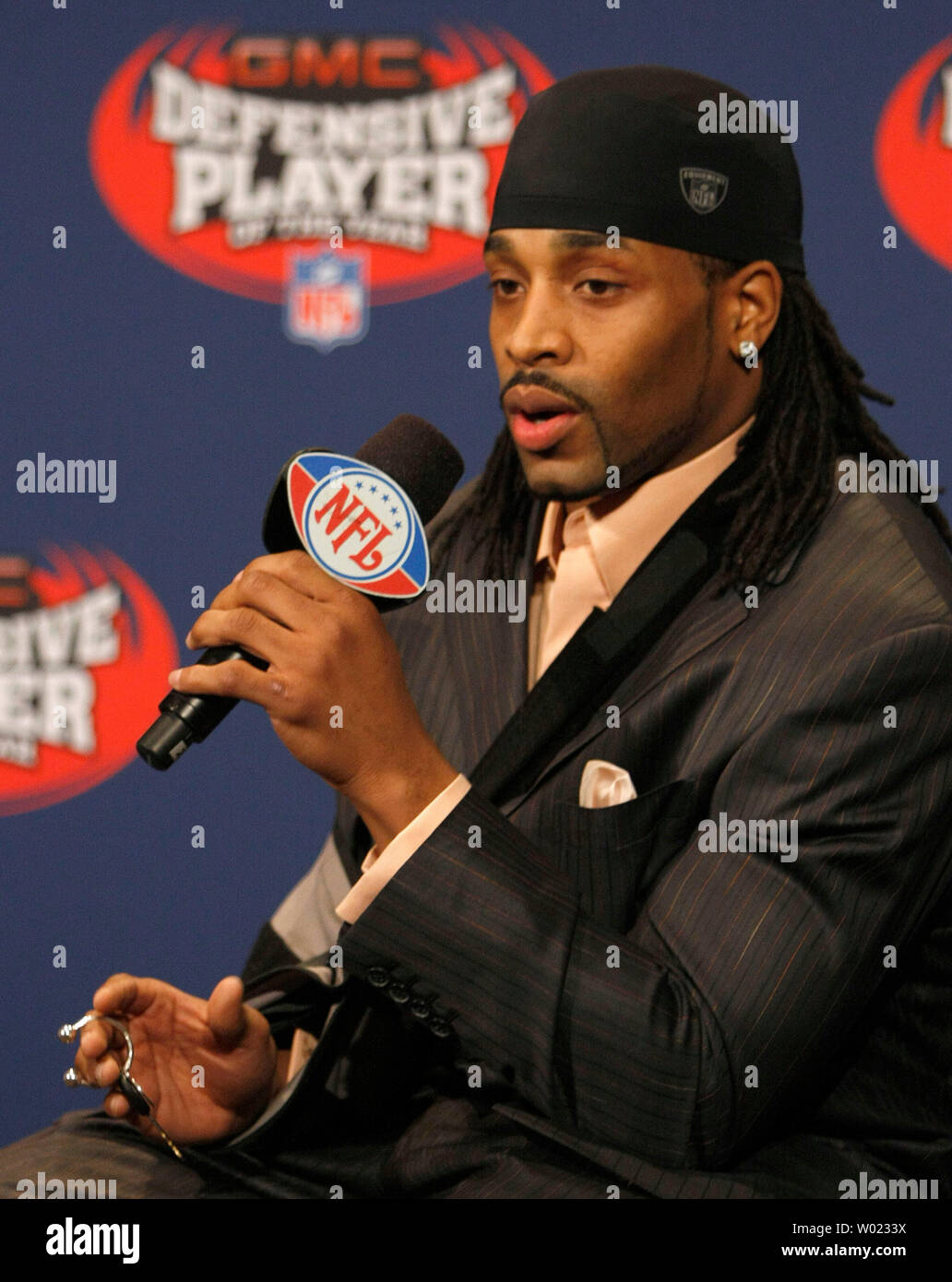 Indianapolis Colts safety Bob Sanders jangles the keys to his new GMC truck after being named the 2007 defensive player of the year during a press conference at the NFL's Super Bowl XLII media center in Phoenix on January 31, 2008.   (UPI Photo/Gary C. Caskey) Stock Photo