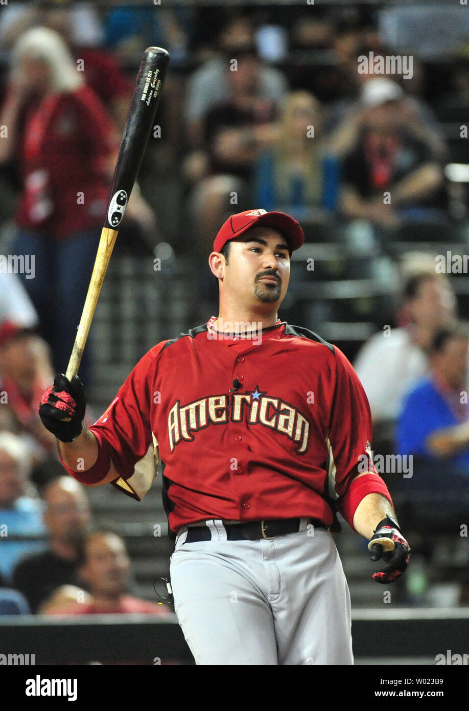 Adrian Gonzalez of the Boston Red Sox reacts after failing to hit a home  run in the 2011 Home Run Derby in Arizona on July 11, 2011. Robinson Cano  of the New