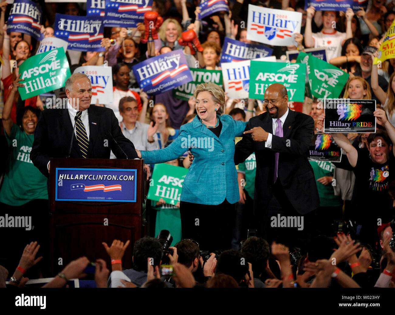 Democratic Presidential candidate Sen. Hillary Clinton (D-NY) celebrates with Pennsylvania Governor Ed Rendell (L) and Philadelphia Mayor Mayor Michael Nutter after winning the Pennsylvania Presidential Primary during a rally in Philadelphia on April 22, 2008. (UPI Photo/Kevin Dietsch) Stock Photo