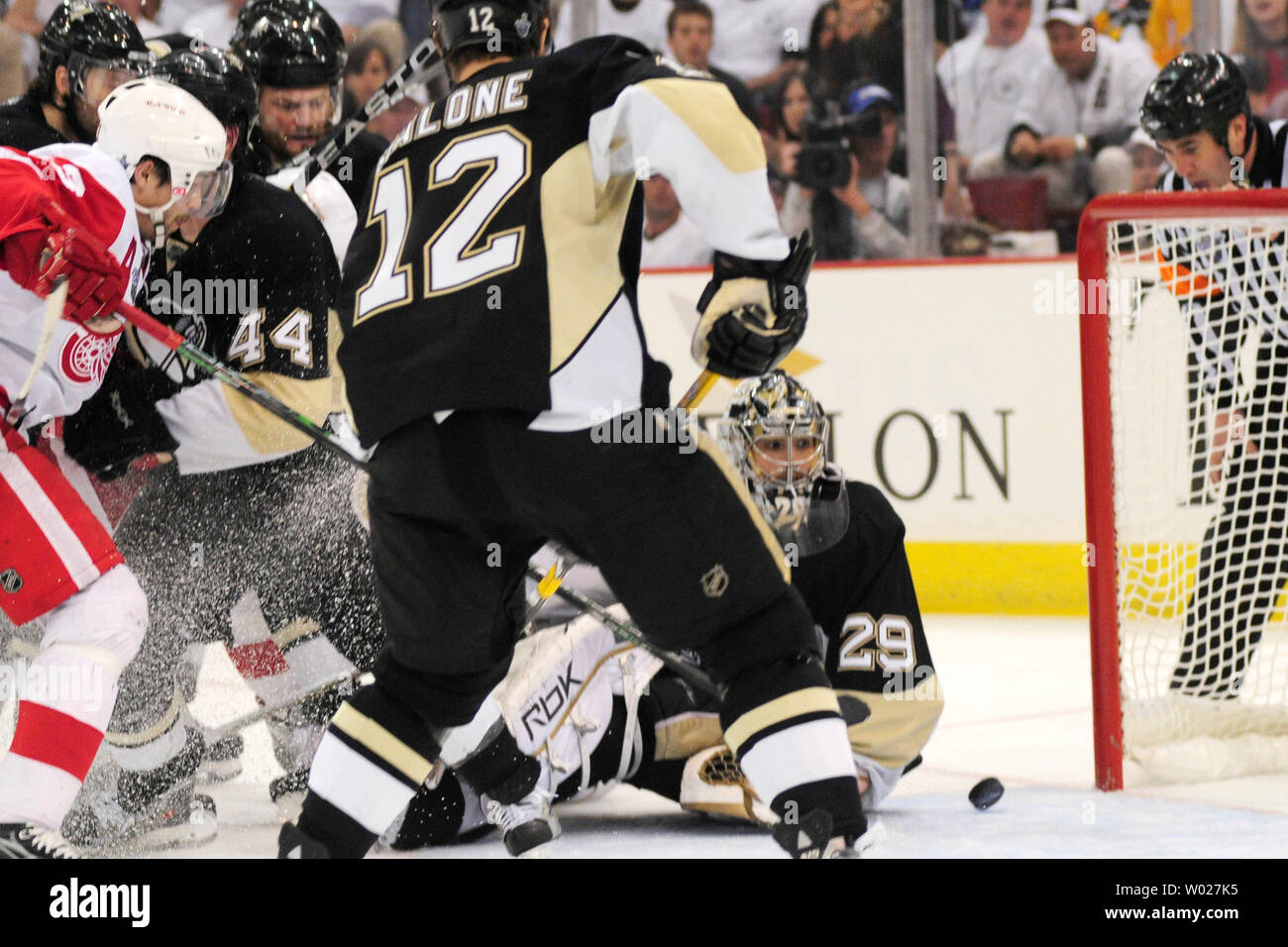 Pittsburgh Penguins goalie Marc-Andre Fleury wave a terrible towel wearing  a Pittsburgh Steelers helmet following the 3-0 shut out win against the New  York Rangers at Mellon Arena in Pittsburgh on January 18, 2009. The  Pittsburgh Steelers play the