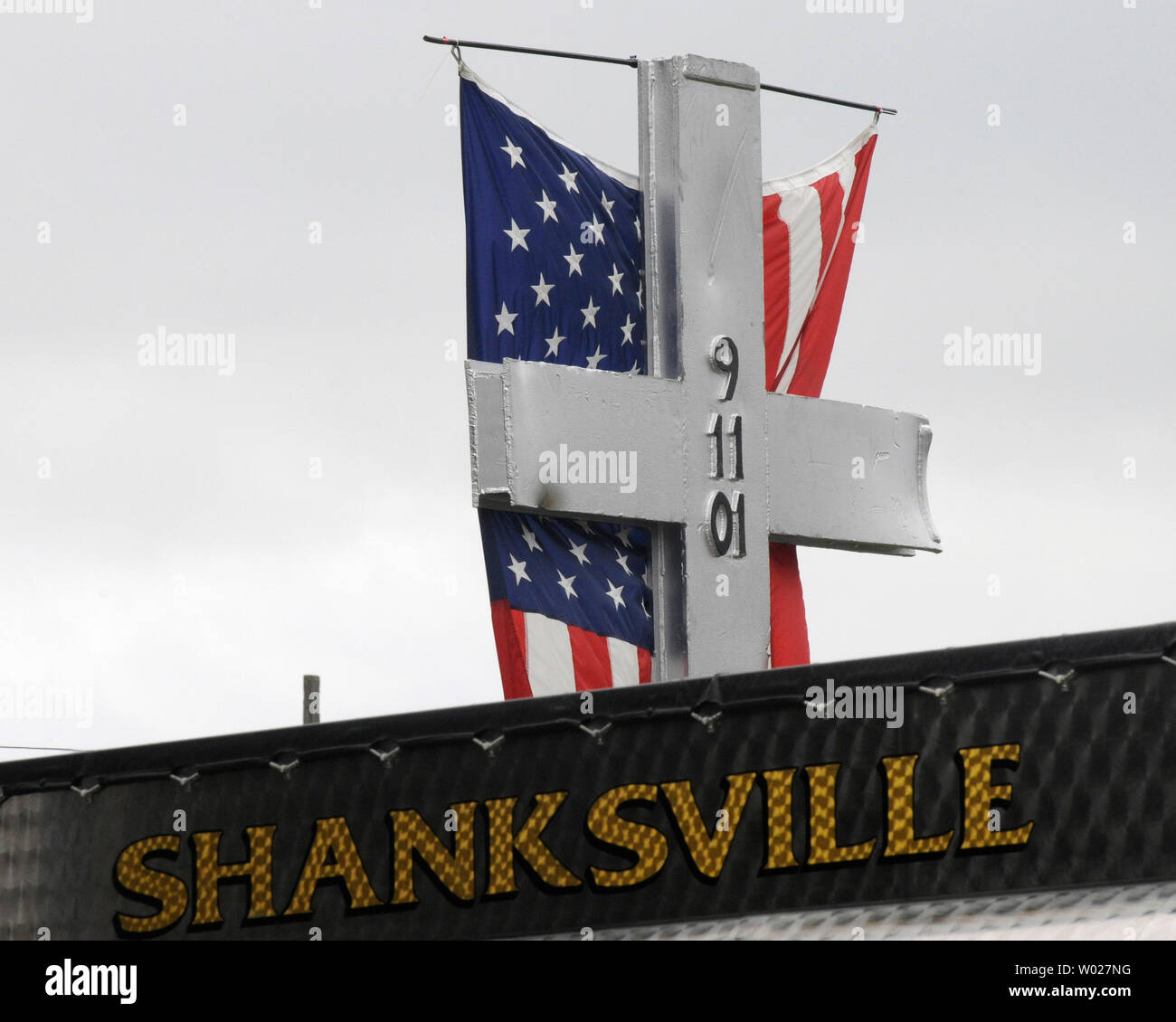 A cross made of metal from the World Trade Center stands outside the