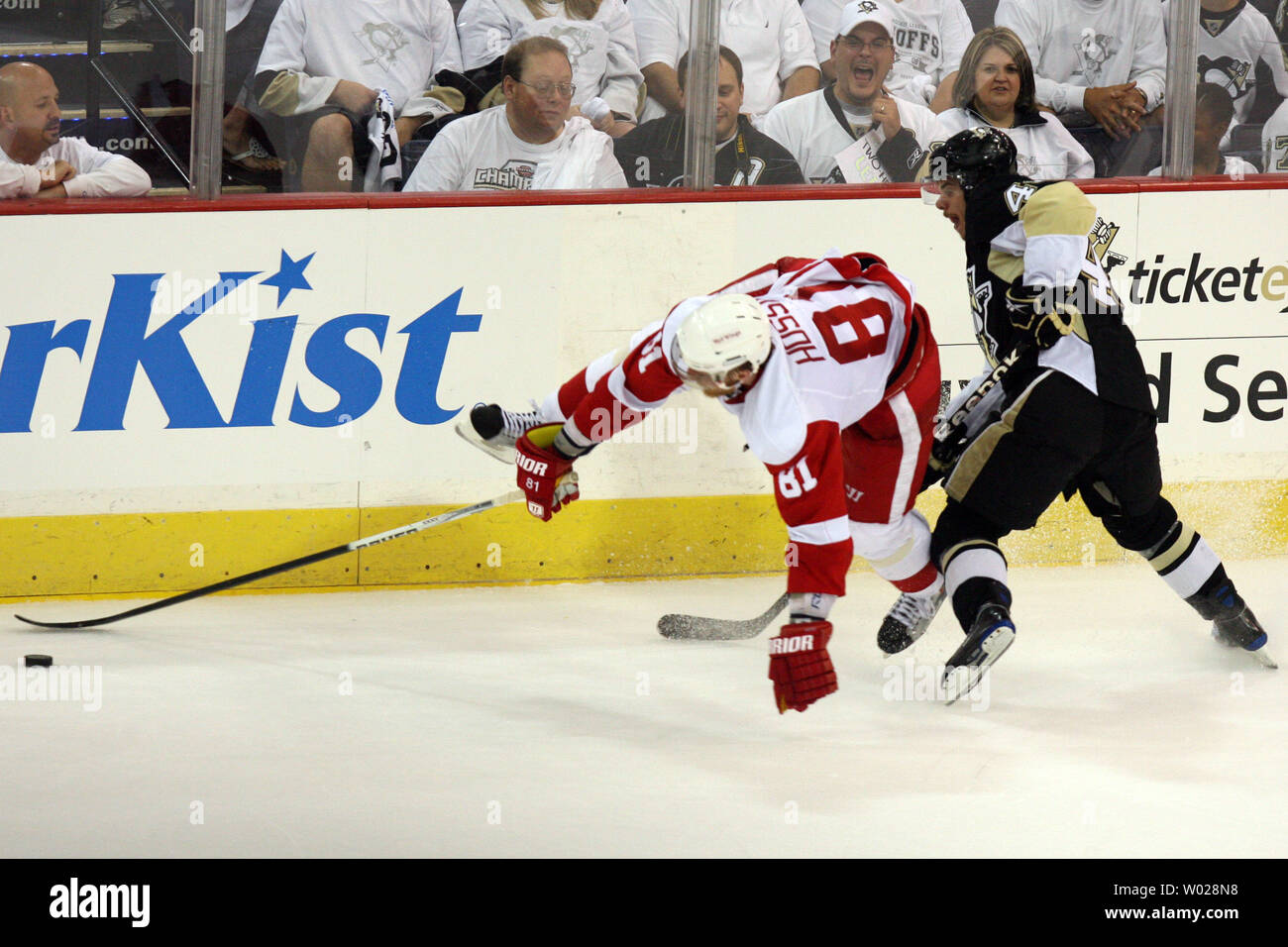 Pittsburgh Penguins Tyler Kennedy (48) runs over Detroit Red Wings Marian Hossa in the third period of the third game of the 2009 Stanley Cup Finals at the Mellon Arena in Pittsburgh on June 2,  2009.    .(UPI Photo/Stephen Gross) Stock Photo