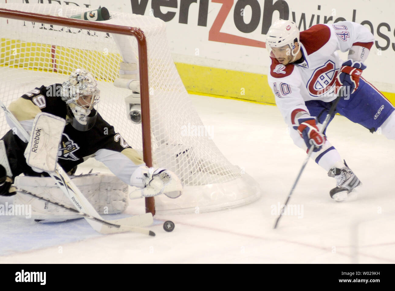 Pittsburgh Penguins goalie Marc-Andre Fleury and Penguins Brooks Orpik (44)  team up to deny Detroit Red Wings Darren McCarty a goal in the third period  of game four of the 2008 Stanley