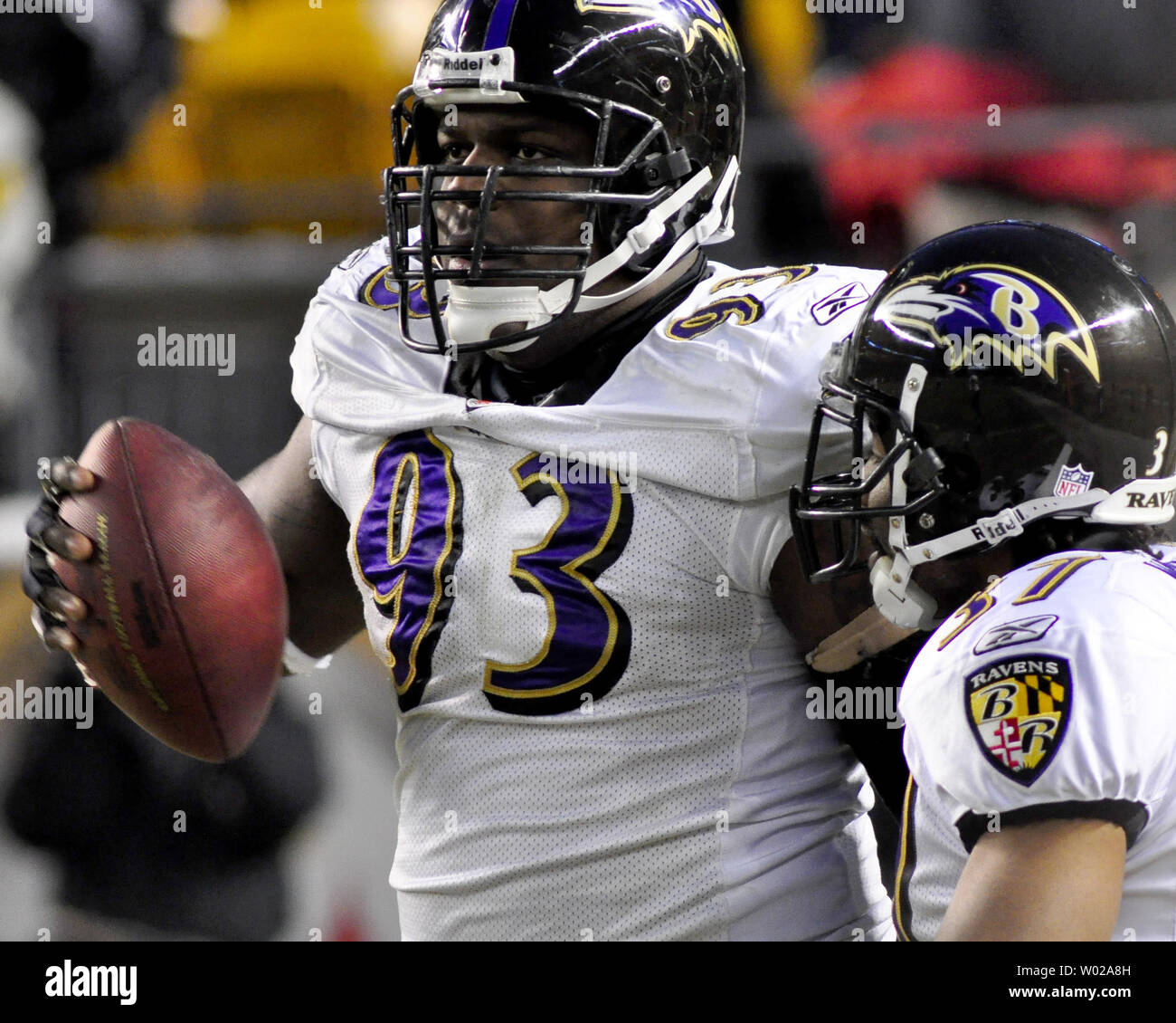 Baltimore Ravens Cory Redding celebrates his fumble recovery for a  touchdown against the Pittsburgh Steelers with Josh Wilson in first quarter  of the AFC Divisional Playoff game at Heinz Field in Pittsburgh,