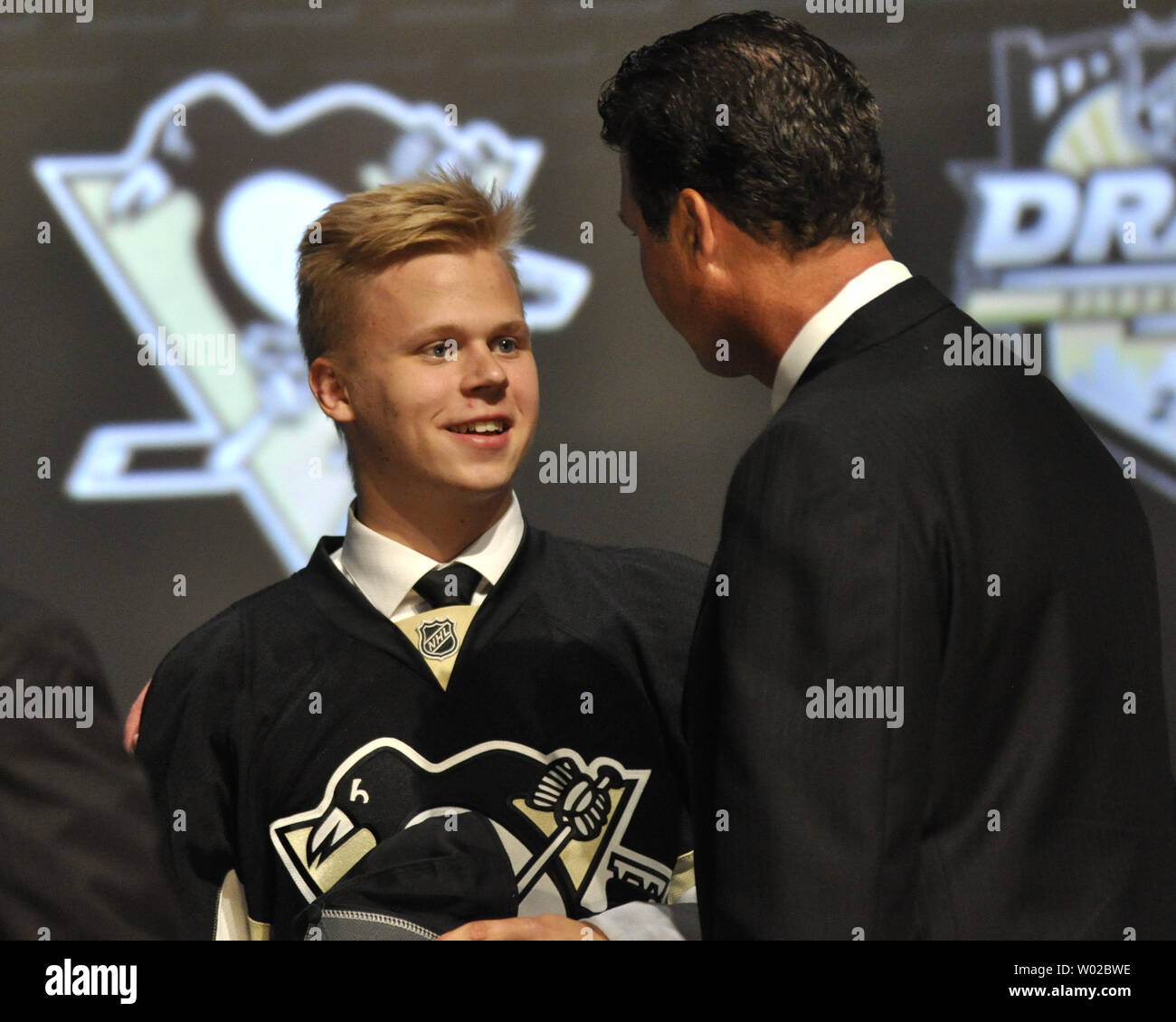 Olli Maatta, of London, England shakes hands with Pittsburgh