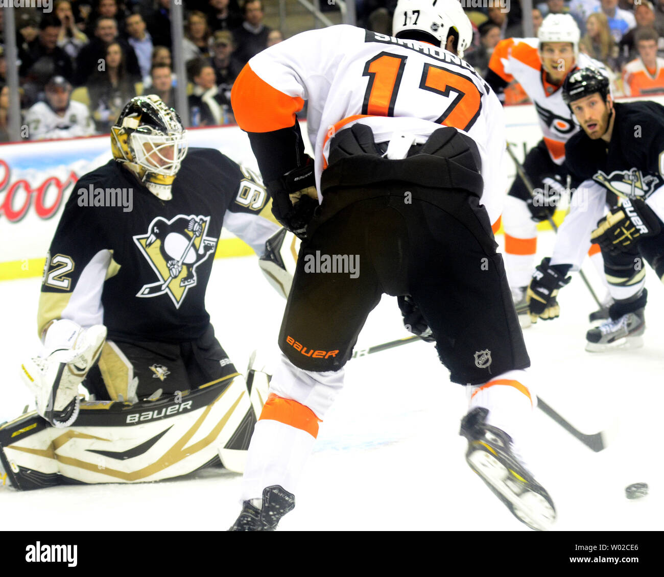 Pittsburgh Penguins goalie Tomas Vokoun (92) allows Philadelphia Flyers right wing Wayne Simmonds (17) to score in the first period at the Consol Energy Center in Pittsburgh on February 20, 2013.   UPI/Archie Carpenter Stock Photo