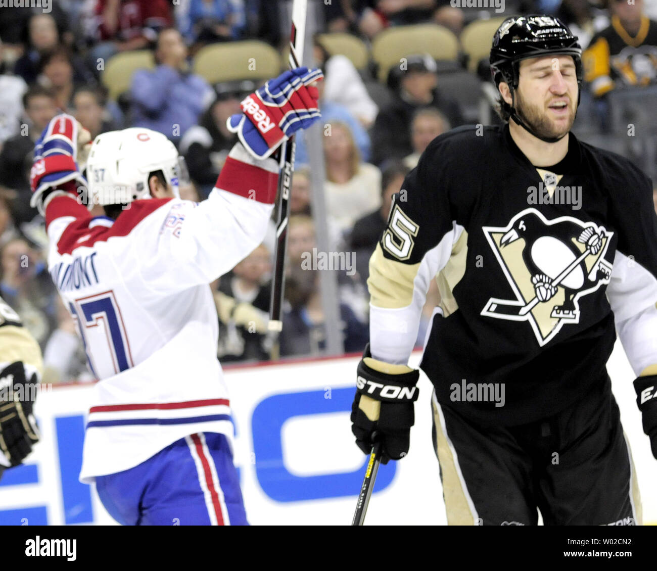 pittsburgh-penguins-center-tanner-glass-15-react-to-montreal-canadiens-center-gabriel-dumont-37-goal-in-the-third-period-of-the-penguins-6-4-win-over-the-canadiens-at-the-consol-energy-center-in-pittsburgh-on-april-17-2013-upiarchie-carpenter-W02CN2.jpg
