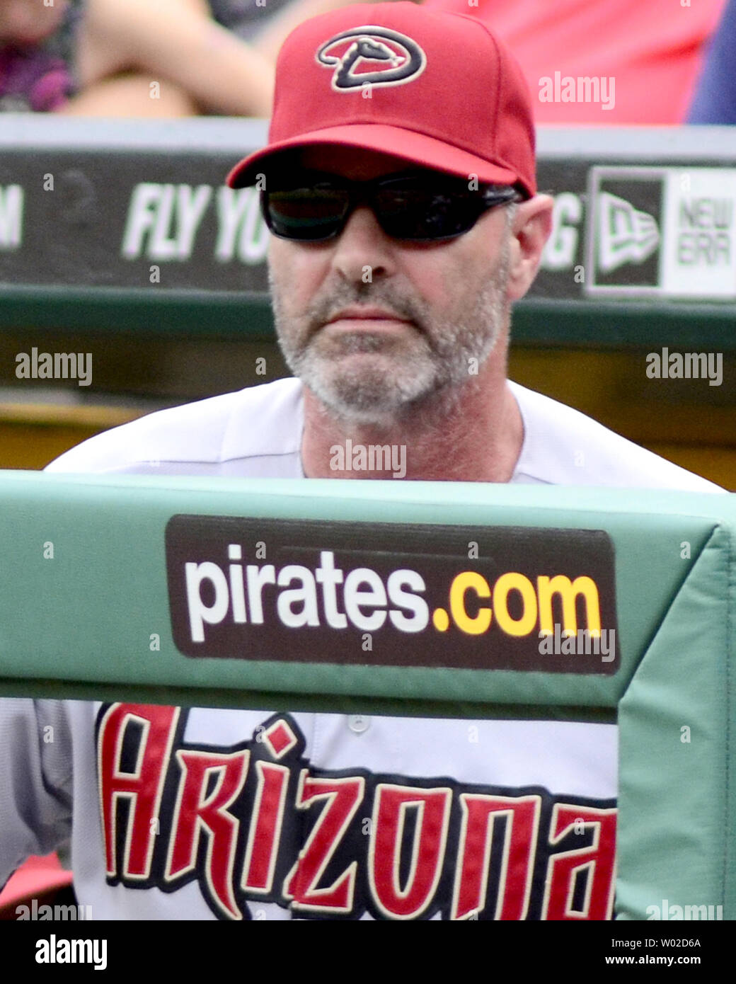 Arizona Diamondbacks manager Kirk Gibson looks out from the dugout in