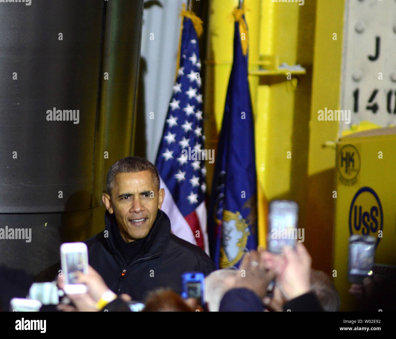 President Barack Obama is meet with a sea of cell phone camera as he enters the U. S. Steel Irvin Plant in West Mifflin, Pennsylvania to address the workers and guests on the second stop of his two day trip following the State of the Union address on January 29, 2014.   UPI/Archie Carpenter Stock Photo