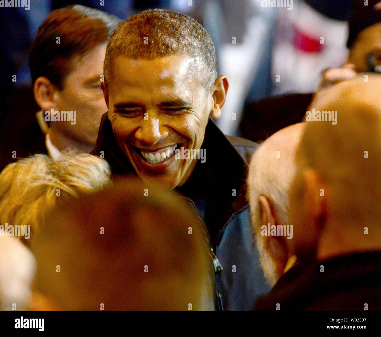 President Barack Obama greets workers and guests at the U. S. Steel Irvin Plant in West Mifflin, Pennsylvania after signing a presidential memorandum for MyIRA, a new retirement plan, on January 29, 2014.   UPI/Archie Carpenter Stock Photo