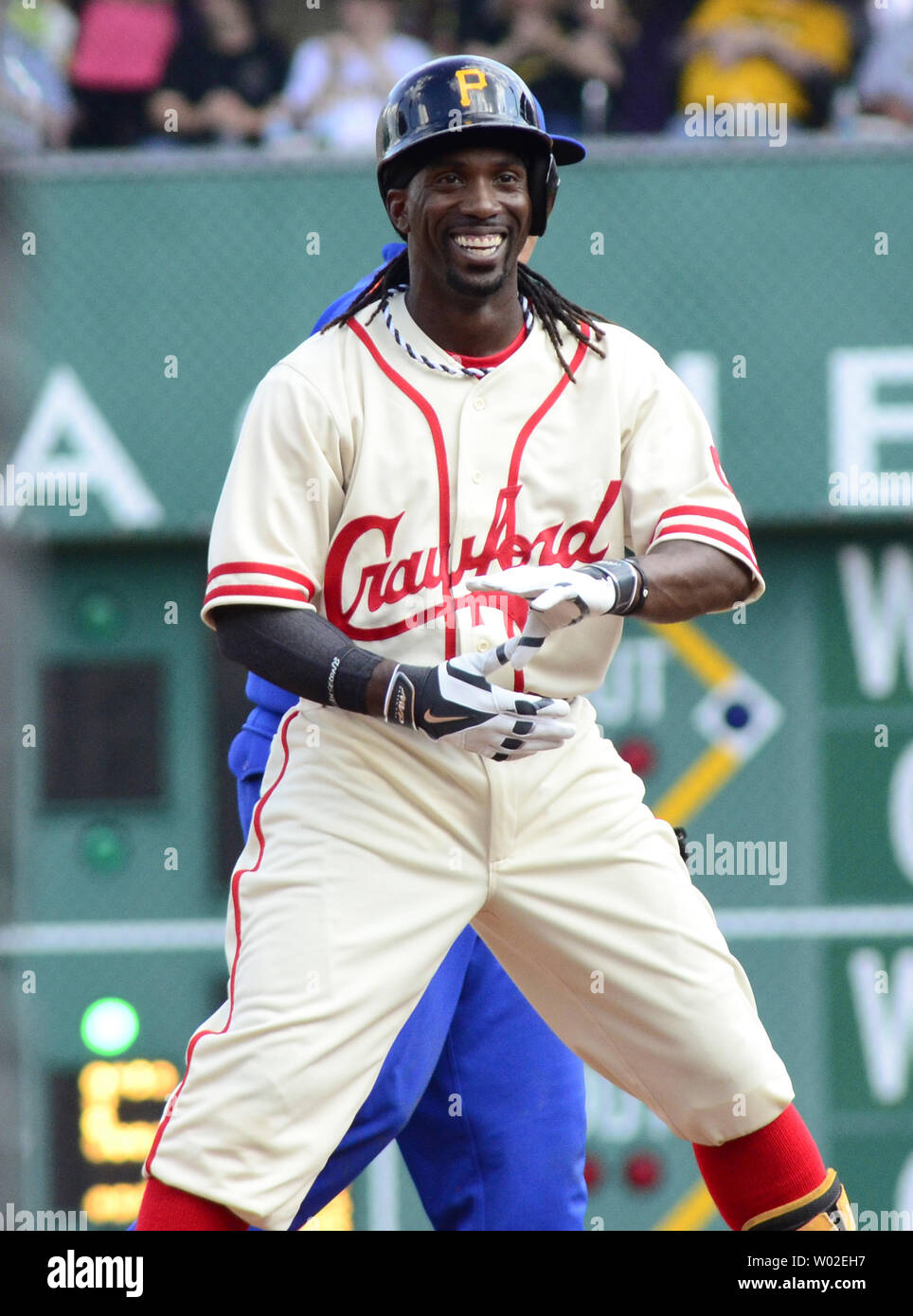 Pittsburgh Pirates center fielder Andrew McCutchen (22) celebrates hitting  double in the fourth inning of the New York Mets 5-3 win at PNC Park in  Pittsburgh, on June 28, 2014. The Pirates