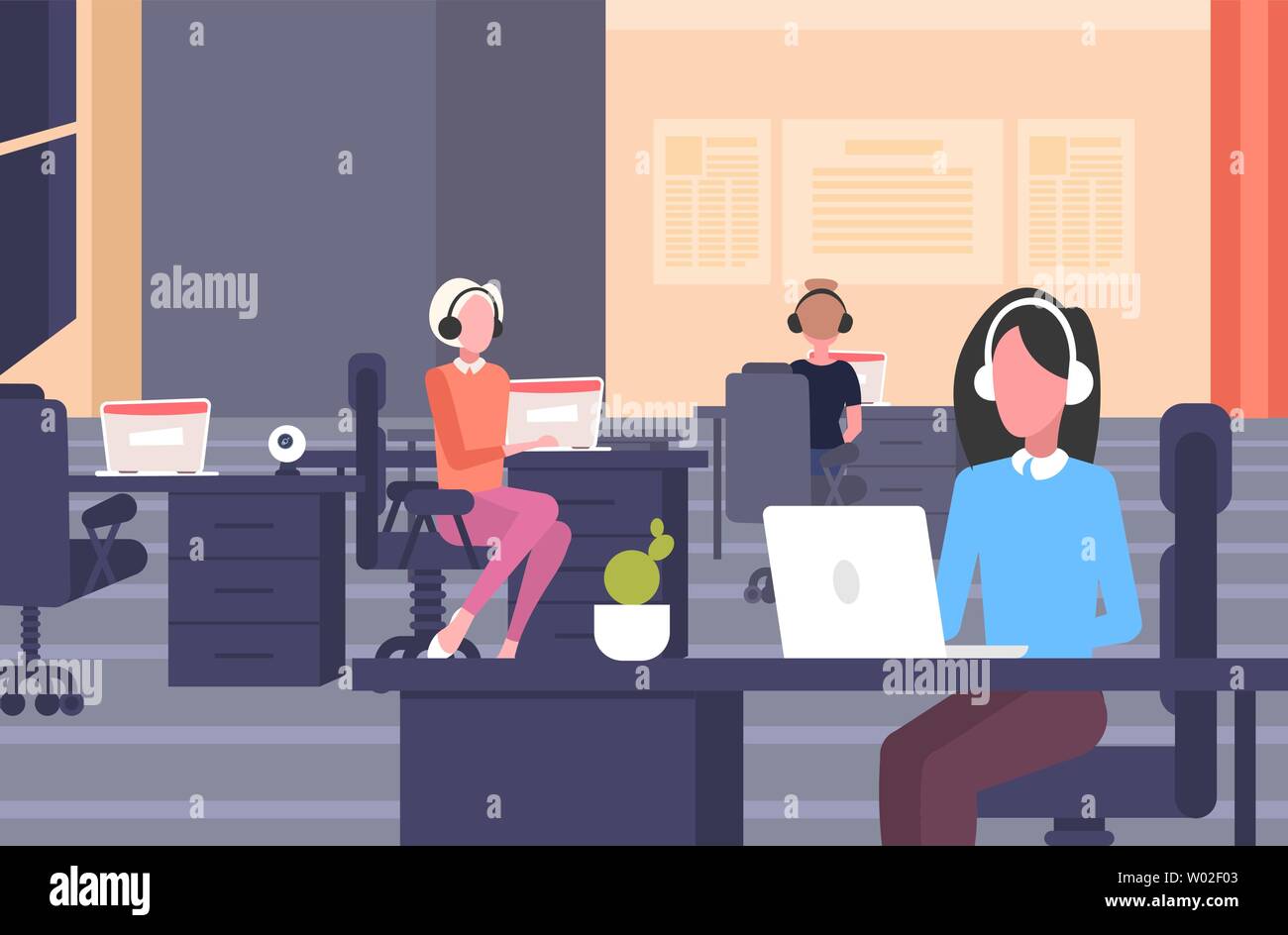 coworkers in headset female operators sitting at workplace desks call ...