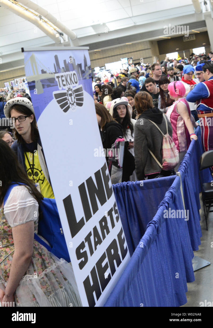 The autograph line for Vic Mignoga stretches the length of the exhibit hall at Tekko, a Japanese Pop Culture festival, in the David Lawrence Convention Center in Pittsburgh on April 7, 2018.   Photo by Archie Carpenter/UPI Stock Photo
