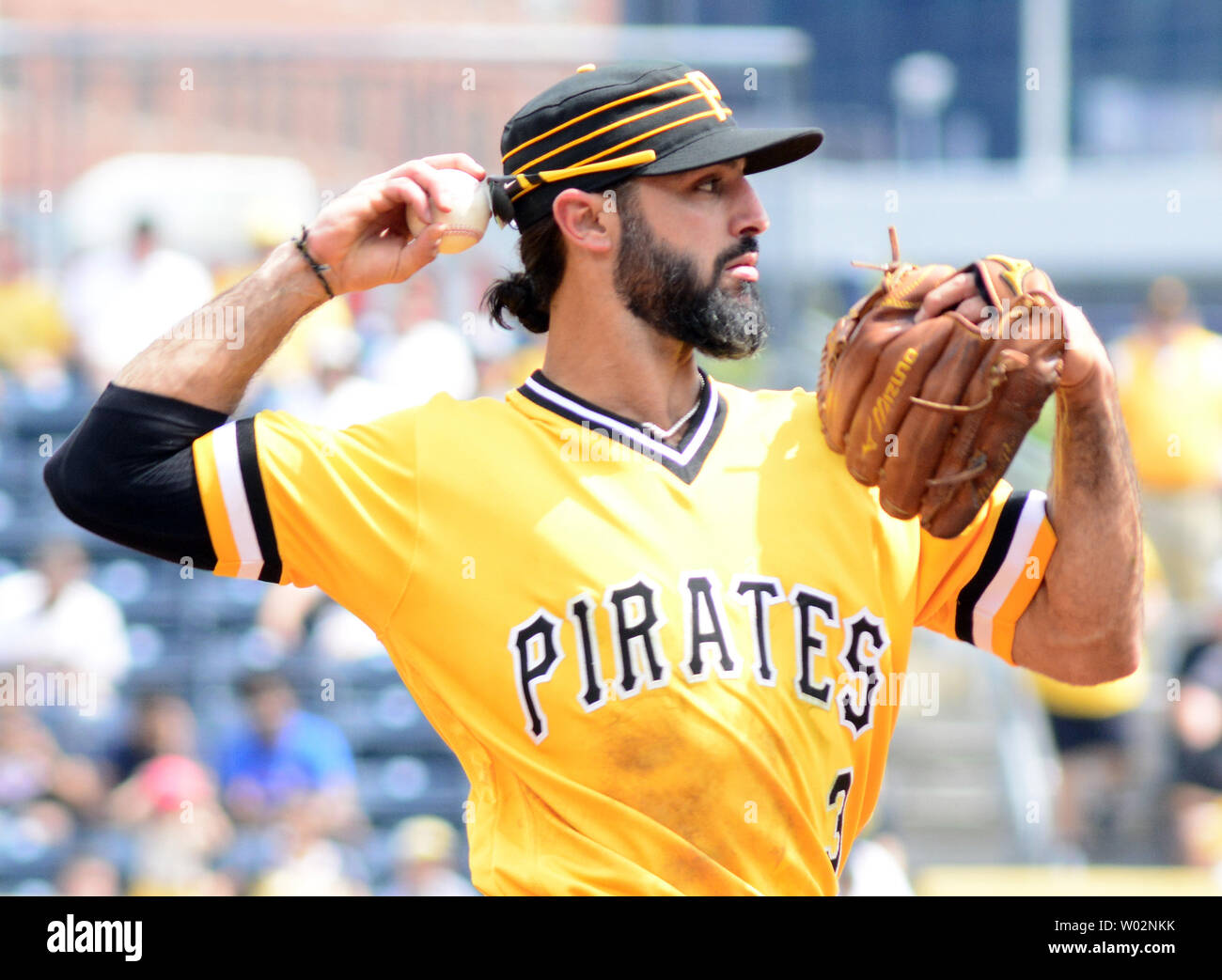 Oliver Onion, left, and Jalapeño Hannah, two of the Pittsburgh Pirates  racing pierogies, race past the outfield stands between innings of a  baseball game between the Pittsburgh Pirates and the Oakland Athletics