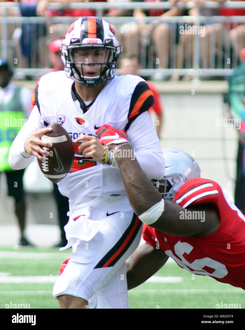 Ohio State Buckeyes defensive tackle Dre'Mont Jones (86) sacks Oregon State Beavers quarterback Conor Blount (2) for a lost of ten yards in the first quarter at Ohio Stadium in Columbus, Ohio on September 1, 2018. Photo by Archie Carpenter/UPI Stock Photo