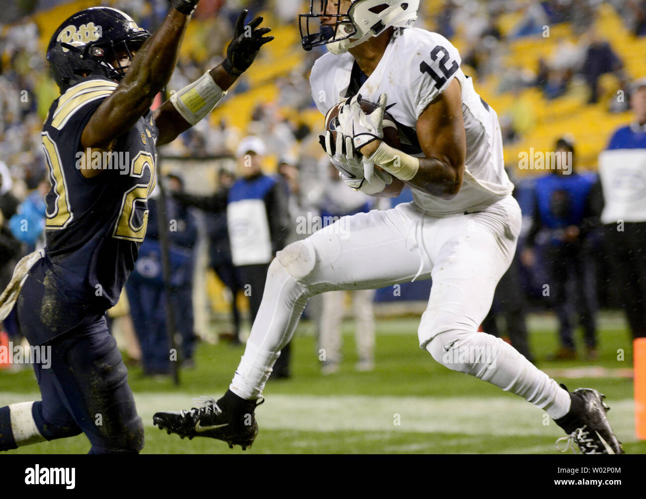 Penn State Nittany Lions wide receiver Mac Hippenhammer (12) pulls in a 11  yard pass for a touchdown with Penn State Nittany Lions cornerback Jabari  Butler (20) in coverage during the fourth