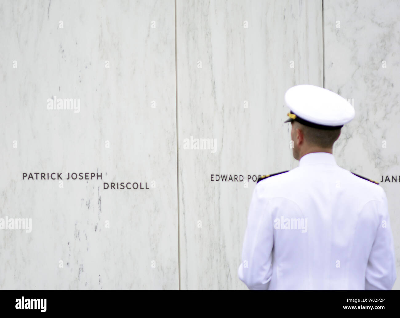 Chaplin Aaron Walling of the USS Somerset walks and pauses at each of the 40 names on the Wall of Names at the Flight 93 National Memorial near Shanksville, Pennsylvania on September 11, 2018.  Photo by Archie Carpenter/UPI Stock Photo