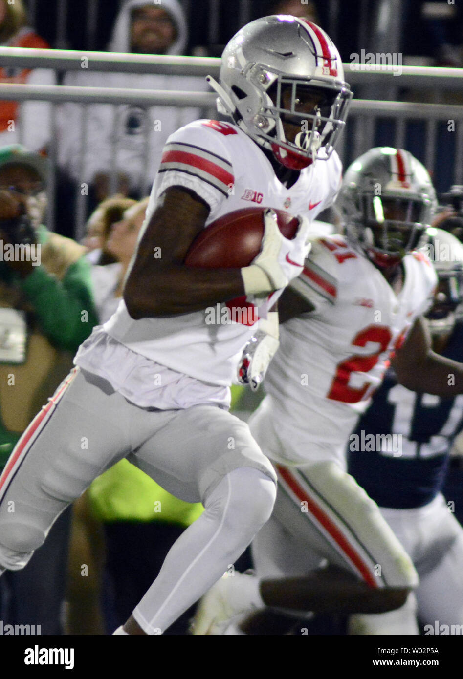 Ohio State Buckeyes wide receiver Binjimen Victor (9) catches the pass from Ohio State Buckeyes quarterback Dwayne Haskins for a touchdown in the fourth quarter of the 27-26 Buckeyes victory against the Penn State Nittany Lions at Beaver Stadium in State College , Pennsylvania on September 29, 2018. Photo by Archie Carpenter/UPI Stock Photo
