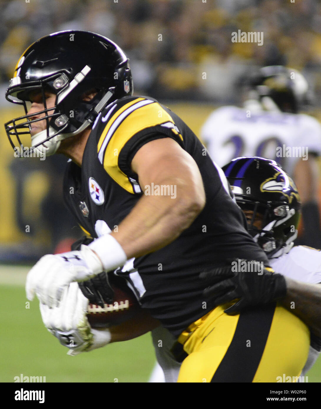 Pittsburgh Steelers tight end Vance McDonald (89) makes the catch but fumbles allowing Baltimore Ravens defensive back Tony Jefferson (23) to recover the football in the first quarter against the Pittsburgh Steelers at Heinz Field in Pittsburgh on September 16, 2018. Photo by Archie Carpenter/UPI Stock Photo