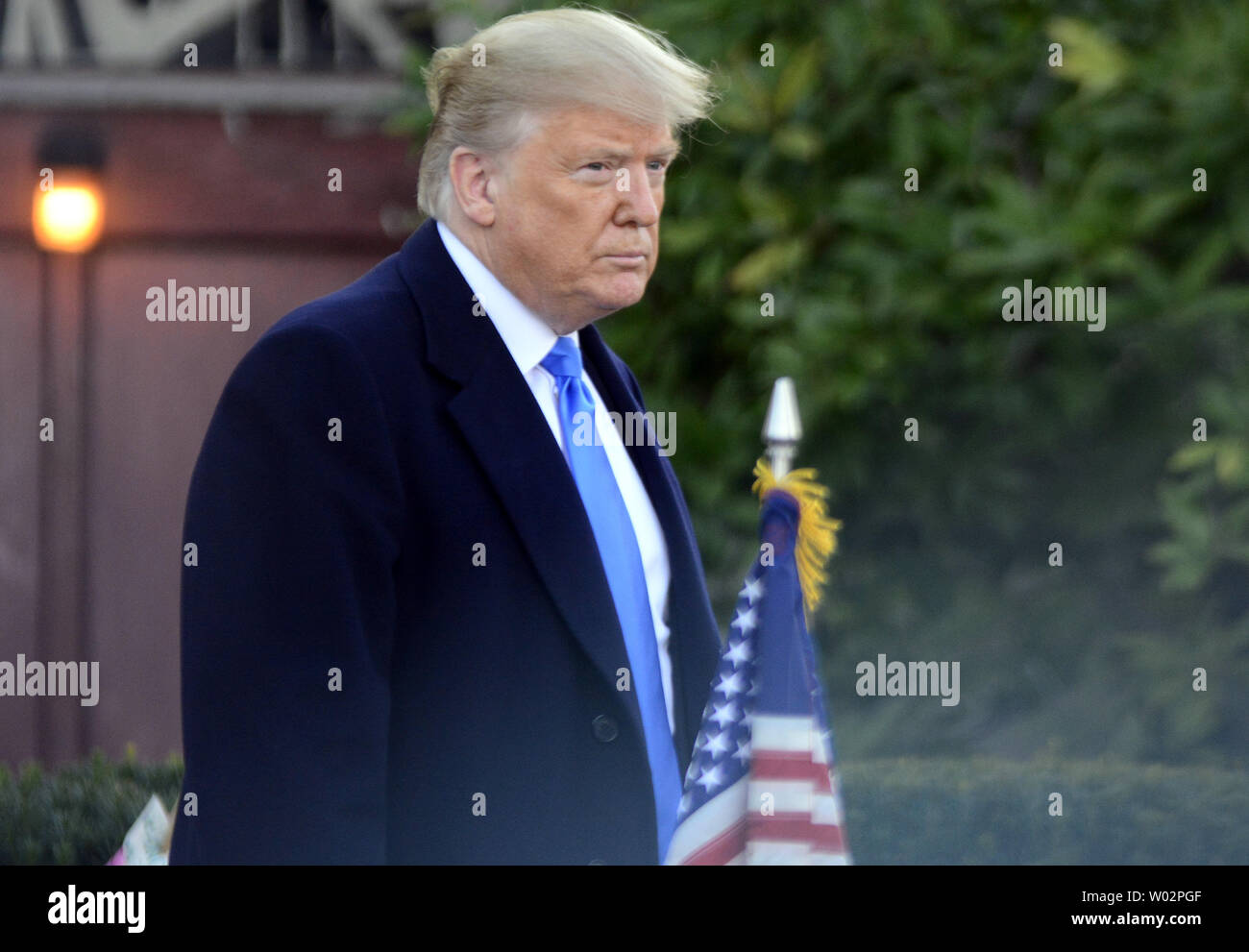 President Donald Trump glances to the media after visiting  the Tree of Life Synagogue to pay his respects to the 11 victims of the mass shooting that happen over the weekend in the Squirrel Hill neighborhood of Pittsburgh on October 30, 2018.  Photo by Archie Carpenter/UPI Stock Photo