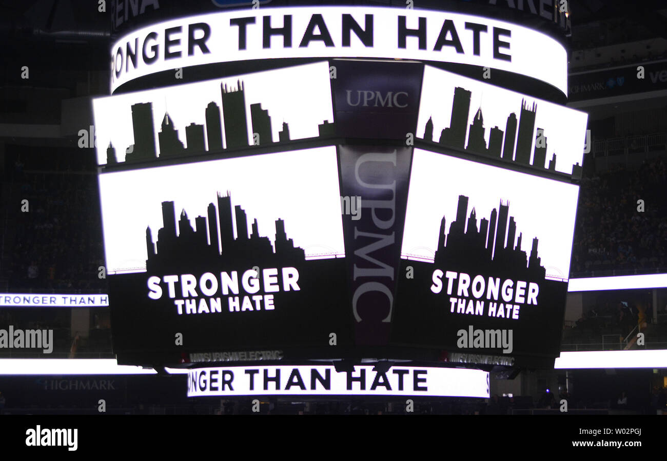The Pittsburgh Penguins Jumbotron displays the message "Stronger Than