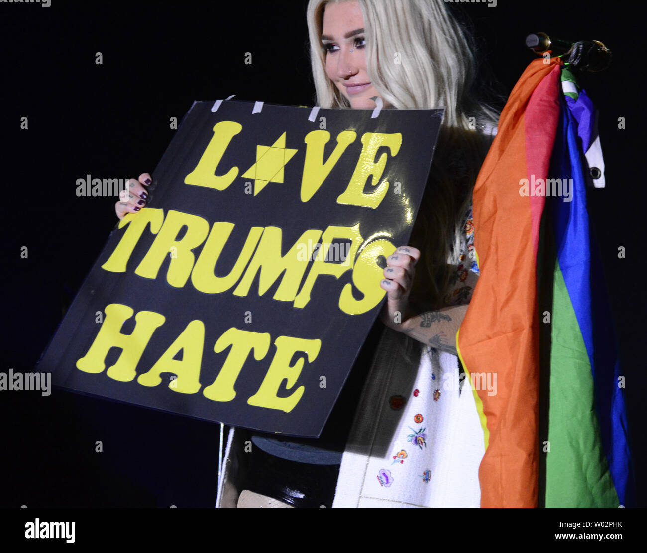 Kesha holds a 'Love Trumps Hate' sign at the Stronger Than Hate concert in downtown Pittsburgh with all the proceeds from the concert going to the Jewish Federation's Our Victims of Terror Fund on November 3, 2018. The concert was held one week after the shooting at the Tree of Life Synagogue.  Photo by Archie Carpenter/UPI Stock Photo