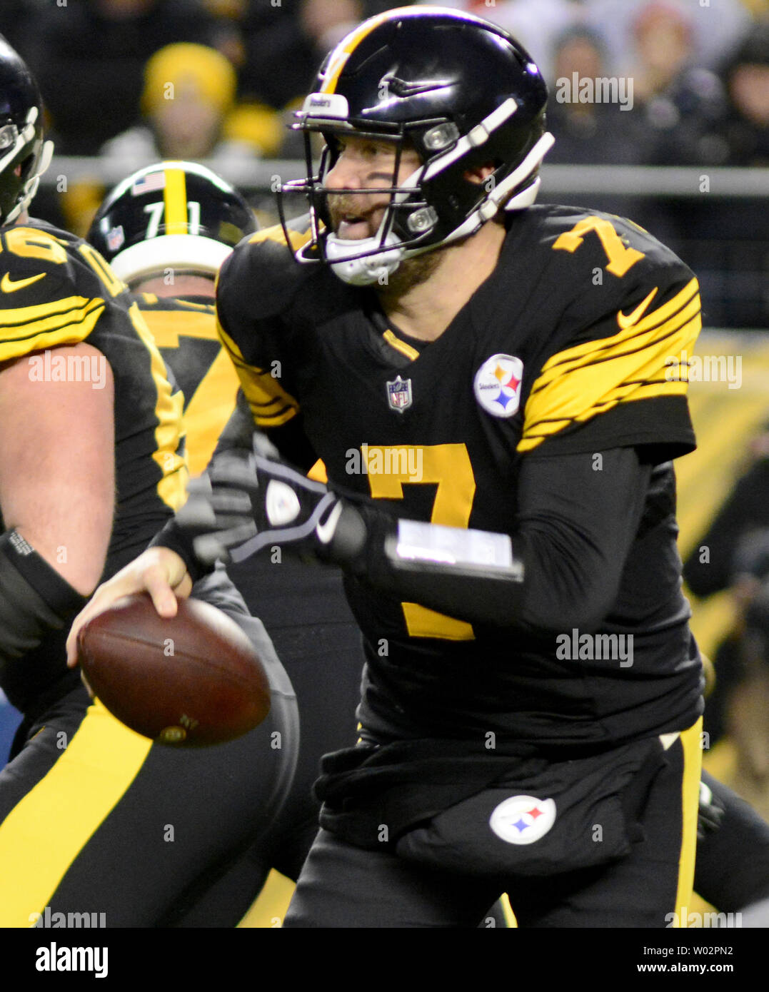 Pittsburgh Steelers quarterback Ben Roethlisberger (7) scrambles to the right and throws in the first quarter against the New England Patriots at Heinz Field in Pittsburgh on December 16, 2018.  Photo by Archie Carpenter/UPI Stock Photo