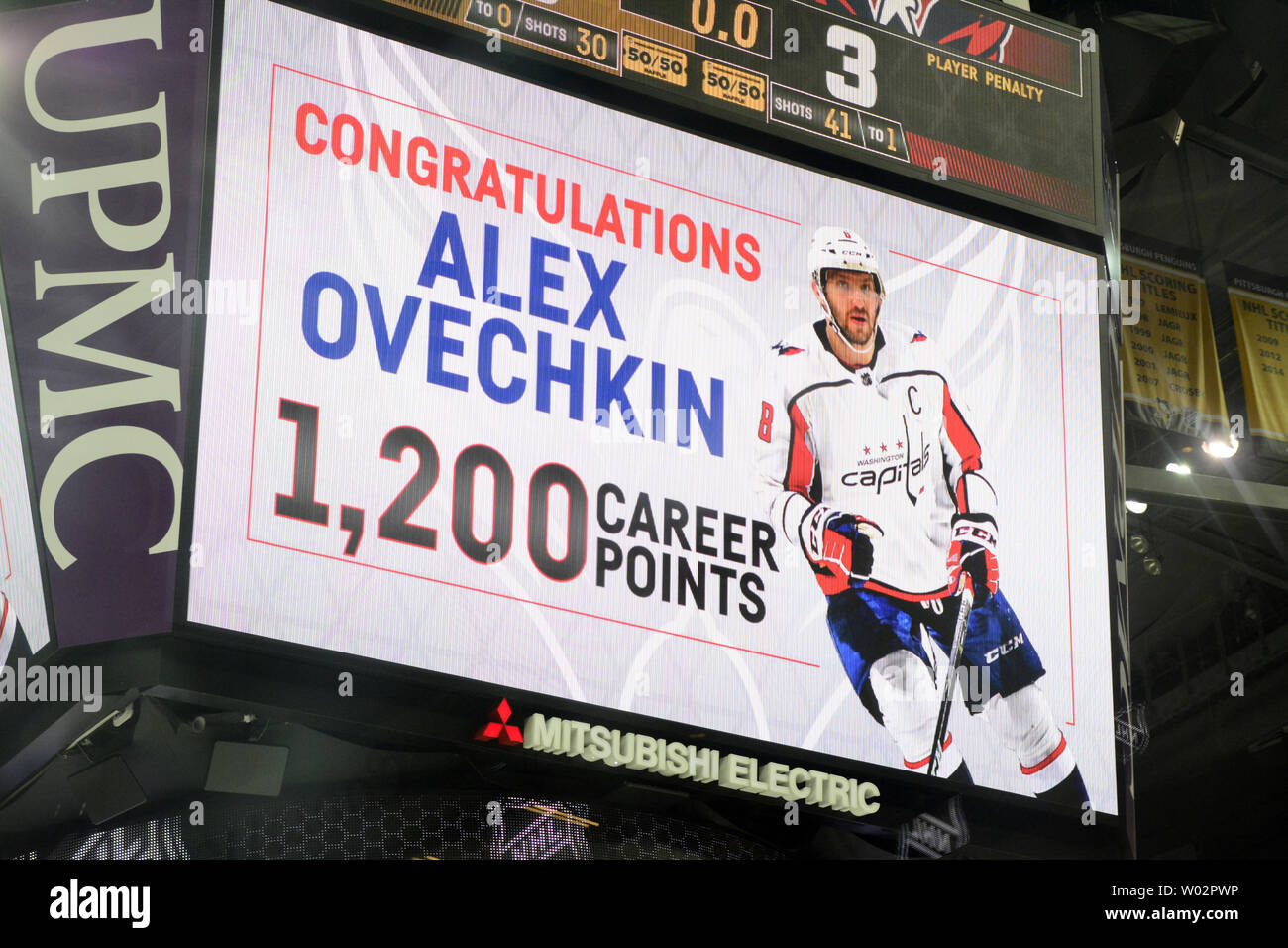 Washington Capitals left wing Alex Ovechkin (8) earns his 1200th career point during the Pittsburgh Penguins 5-3 win against the Washington Capitals at PPG Paints Arena in Pittsburgh on March 12, 2018.     Photo by Archie Carpenter/UPI Stock Photo