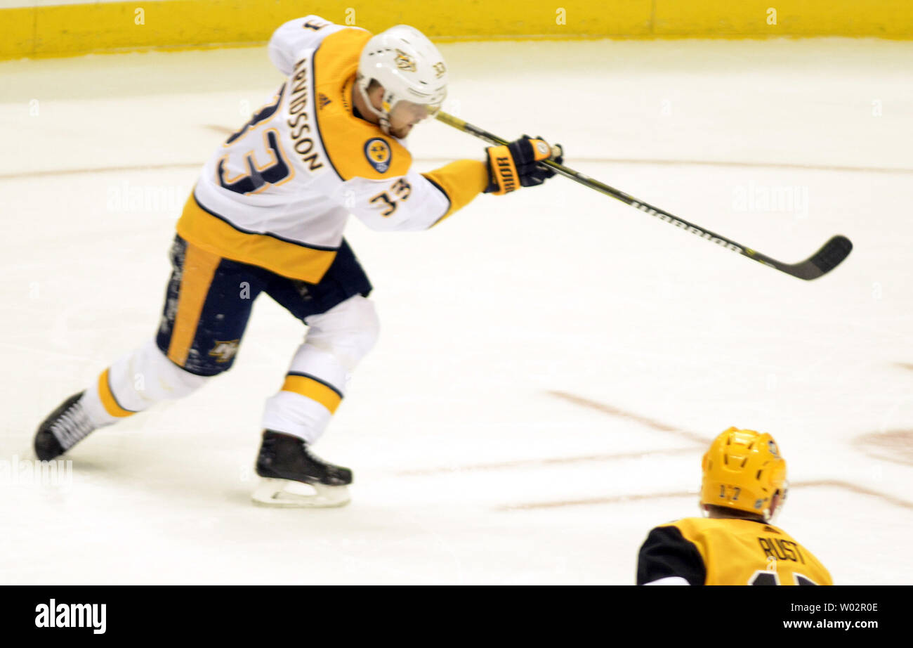 Nashville Predators right wing Viktor Arvidsson (33) shots and scores in the second period of the Predators 3-1 win against the Pittsburgh Penguins at PPG Paints Arena in Pittsburgh on March 29, 2018.   Photo by Archie Carpenter/UPI Stock Photo