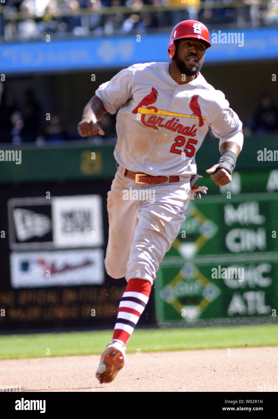 St. Louis Cardinals right fielder Dexter Fowler (25) scores on St. Louis Cardinals second baseman Kolten Wong homer in the seventh inning against the St. Louis Cardinals at PNC Park on April 1, 2019 in Pittsburgh.  Photo by Archie Carpenter/UPI Stock Photo