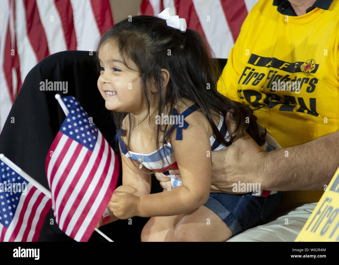 A young supporter of the waits for the arrival of former Vice President Joe Biden as he kicks off his Democratic presidential nomination campaign at the Teamster Union Hall of Local 249 in Pittsburgh on April, 2019.   Photo by Archie Carpenter/UPI Stock Photo