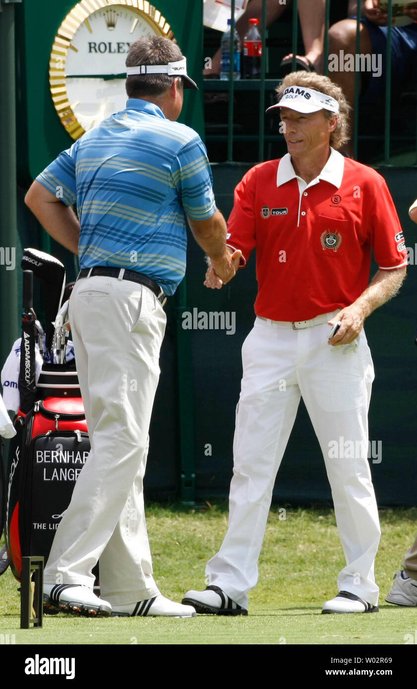Co-leaders Bernhard Langer (R), from Munich, Germany, greets Kenny Perry (L), from Franklin, Kentucky, on the #1 tee to start their third round of The Players Championship PGA golf tournament in Ponte Vedra Beach, Florida on May 10, 2008 .   (UPI Photo/Mark Wallheiser) Stock Photo