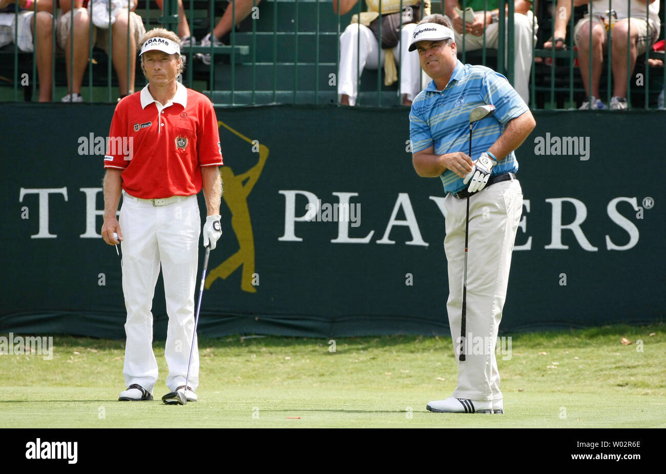 Bernhard Langer (L), from Munich, Germany, and Kenny Perry (R), from Franklin, Kentucky, watch Perry's drive from the #1 tee to start their third round of The Players Championship PGA golf tournament in Ponte Vedra Beach, Florida on May 10, 2008 .   (UPI Photo/Mark Wallheiser) Stock Photo