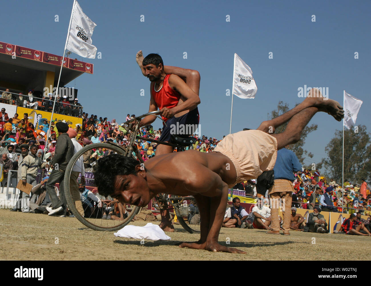 Indian handicapped villagers show their talents during the Kila Raipur Sports festival, also known as the Rural Olympics near Ludhiana on February 9, 2008. The games started in 1933 and take place over a three-day period during which competitors enter various rural sports events including equestrian events, bullock cart races and shows of strength.  (UPI Photo) Stock Photo