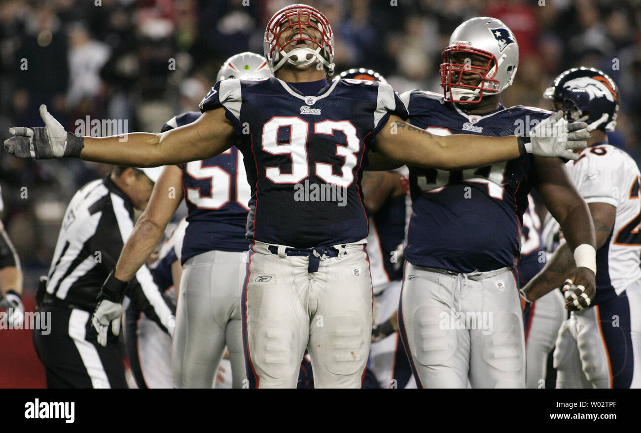 New England Patriots defensive lineman Richard Seymour (93) celebrates with teammate defensive lineman Ty Warren (94) after Seymour sacked Denver Broncos quarterback Jay Cutler (6) in the third quarter at Gillette Stadium in Foxboro, Massachusetts on October 20, 2008.  The Patriots defeated the Broncos 41-7. (UPI Photo/Matthew Healey) Stock Photo