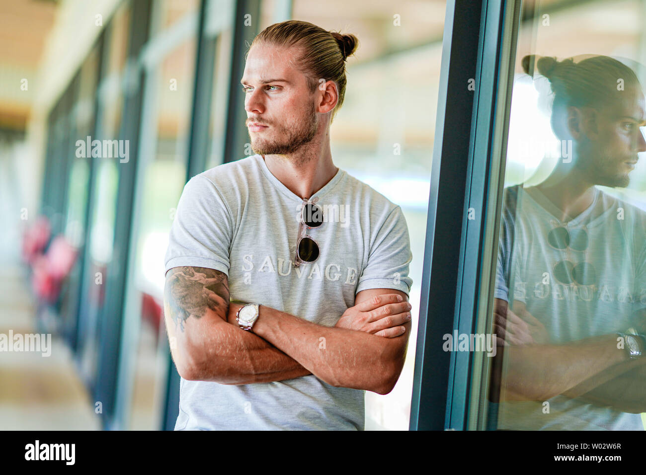 Sandhausen, Germany. 25th June, 2019. Rurik Gislason, player of the second division soccer team SV Sandhausen, is standing on the stadium grandstand. Gislason from SV Sandhausen became world famous a year ago. Not because he delivered sensational performances for Iceland at the World Cup in Russia, but because of his appearance. (to dpa 'One year after the hype: The new life of the 'beautiful' Rurik Gislason') Credit: Uwe Anspach/dpa/Alamy Live News Stock Photo